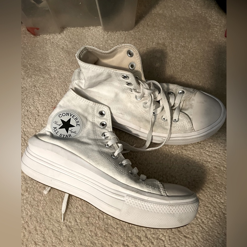 High Top converse. Thicker bottom than normal converse. Can come with shoe laces